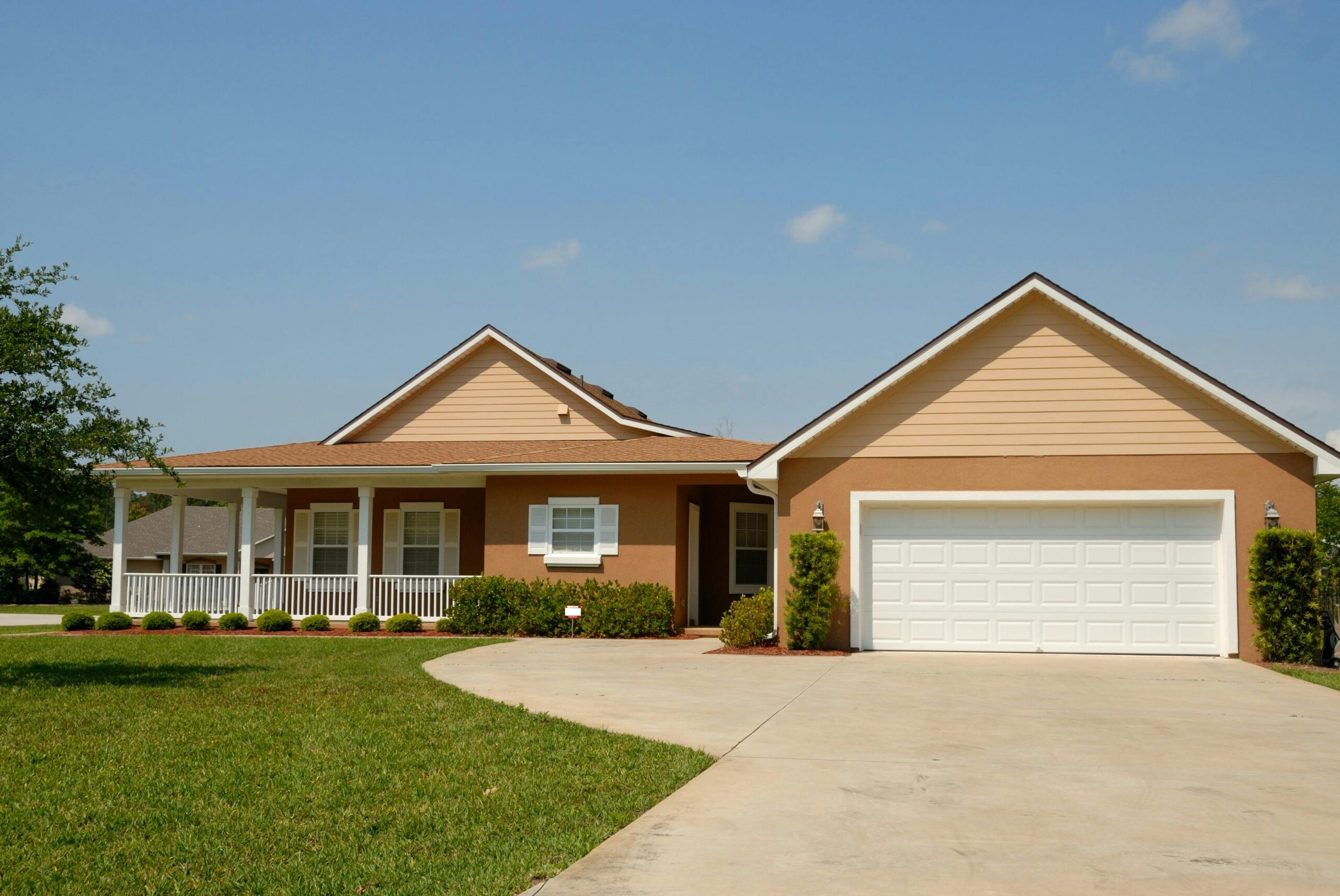 Image of single-story house. Learn what fees to expect when financing a rental property. 